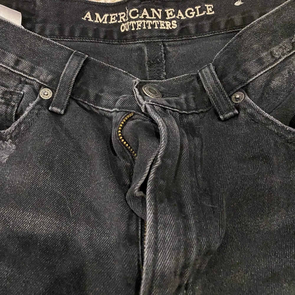 American Eagle black jeans with tears!